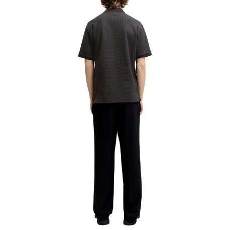 Polo en coton mélangé noir uni avec une coupe droite et un col boutonné - Image 6