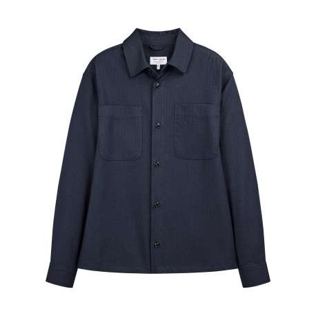 Chemise marine unie avec une coupe droite et un col à revers