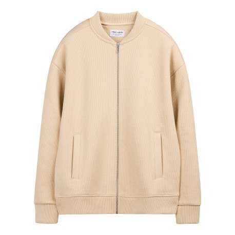 Gilet beige uni avec une coupe oversize et un col montant zippé