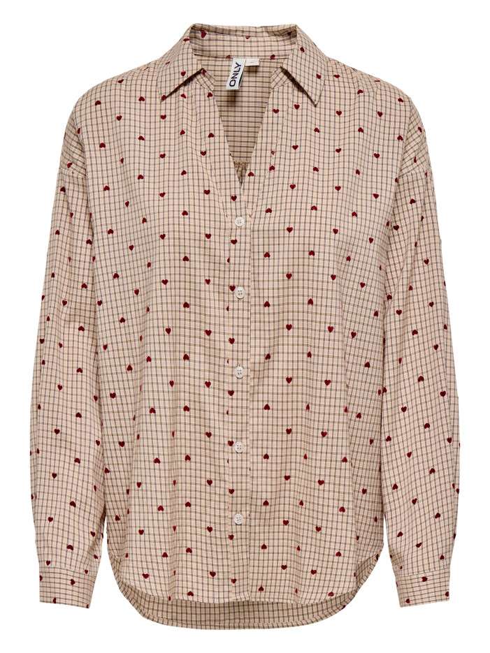 Chemisier beige à motifs...