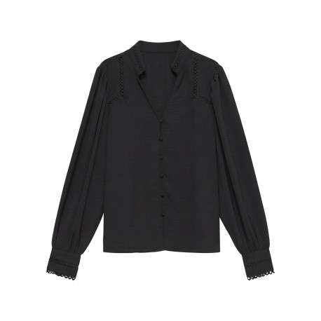 Chemisier noir uni avec une coupe droite et des manches longues