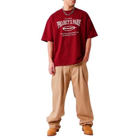Pantalon 5 poches en coton beige uni avec une coupe bootcut