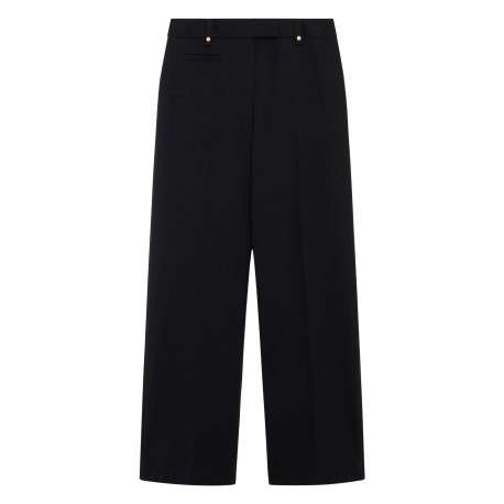 Pantalon noir uni avec une coupe droite muni d'un zip et d'une agrafe