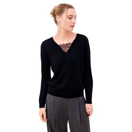Pull noir uni avec une coupe droite et des manches longues - Image 2