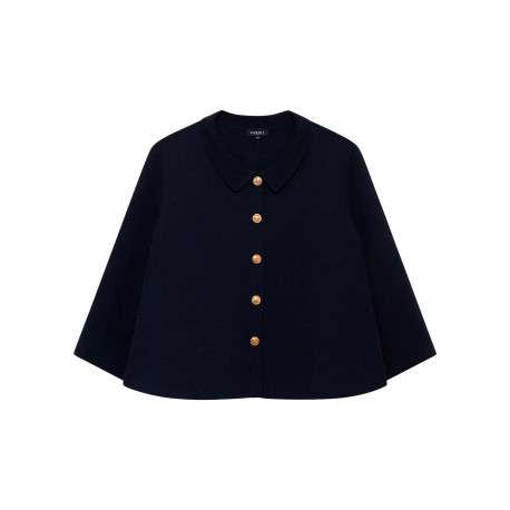Manteau marine uni muni d'une coupe large et d'un col à revers