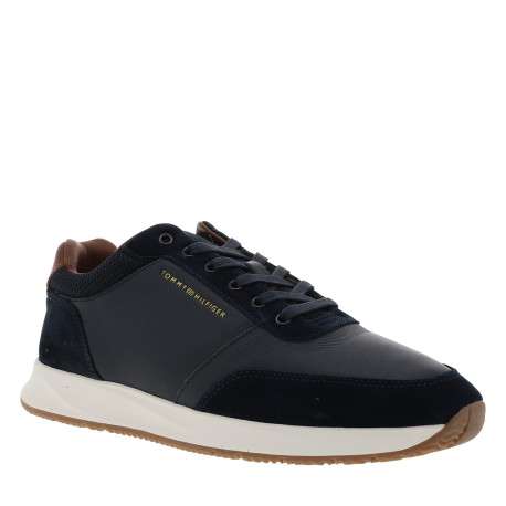 Basket en cuir bleu marine à semelle plate et une fermeture à lacets