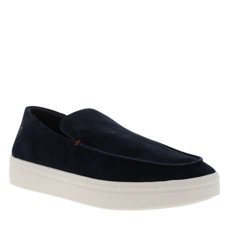 Mocassins en cuir bleu marine à semelle plate et un logo embossé sur la semelle