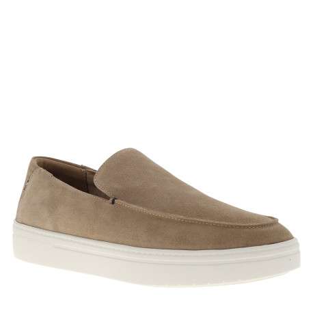 Mocassins en cuir camel à semelle plate et un logo embossé sur la semelle