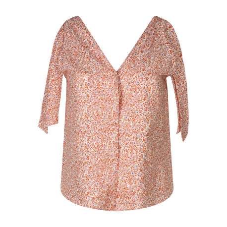 Blouse en coton rouge floral avec une coupe droite et un col v