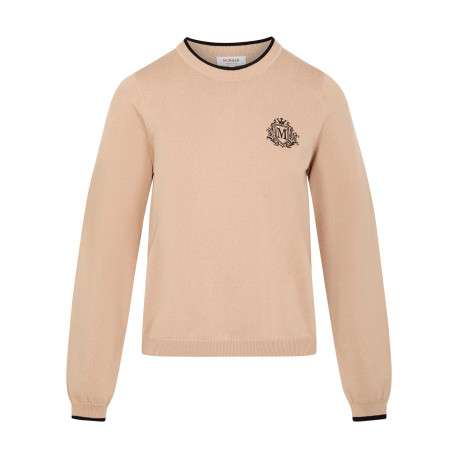 Pull beige uni avec une coupe droite et des manches longues