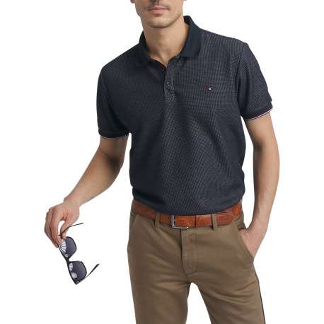 Polo bleu marine à pois doté d'une coupe droite et d'un col boutonné
