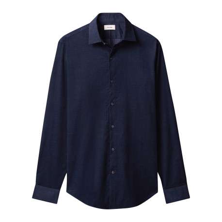 Chemise en coton bleu marine unie en velours à coupe slim avec un col à revers