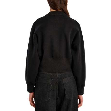 Pull noir avec une coupe droite doté de manches longues et des boutons coeurs - Image 3