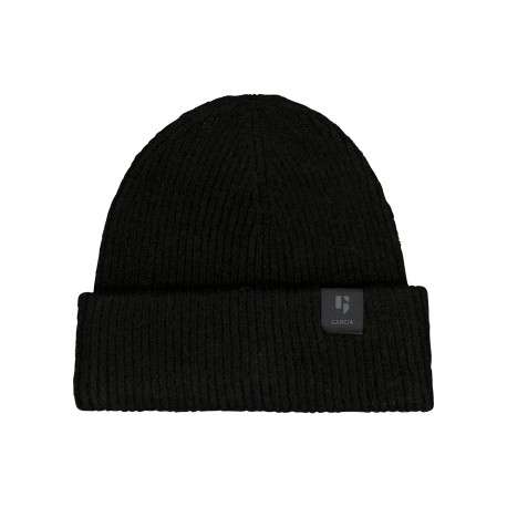 Bonnet noir en maille tricotée pourvu de l'étiquette de la marque