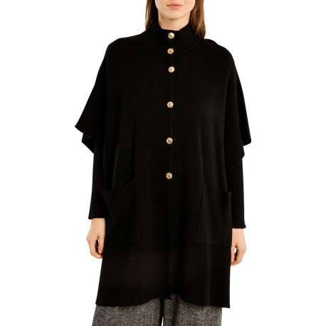 Pull noir doté d'une coupe large et agrémenté d'un col montant