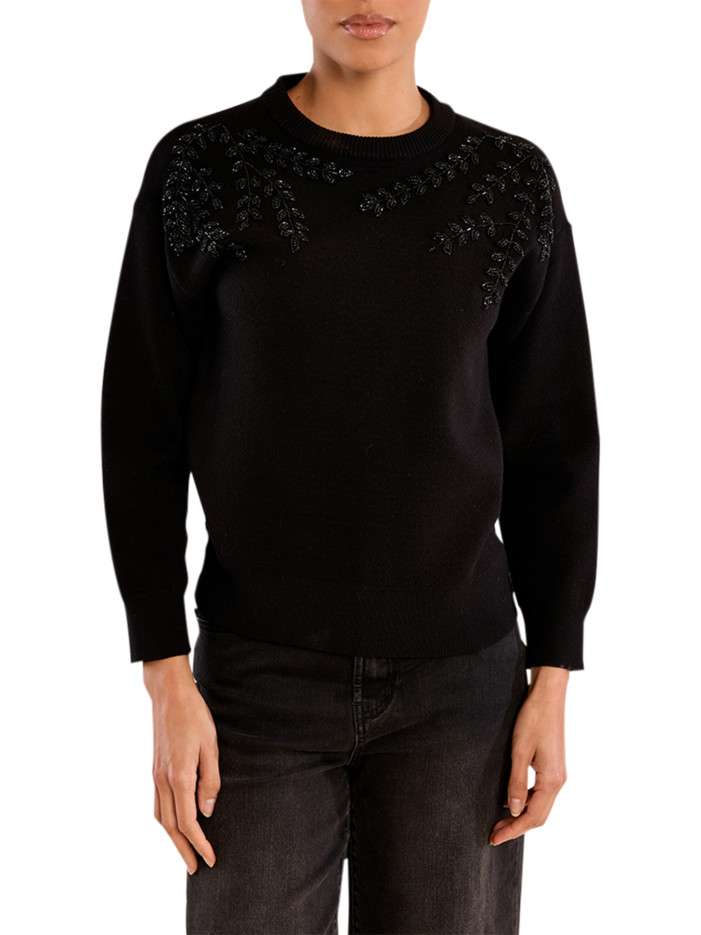 Pull noir à motif feuillage...