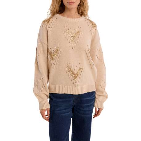 Pull beige à coupe droite pourvu de manches longues et de motifs