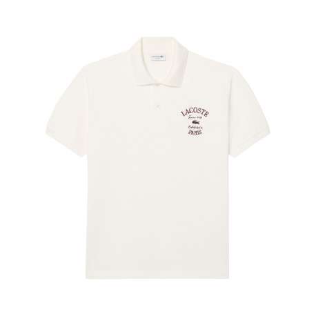 Polo style rétro en coton écru avec une coupe droite et un col boutonné