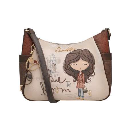 Sac à bandoulière beige à motifs pourvu d'une bandoulière réglable