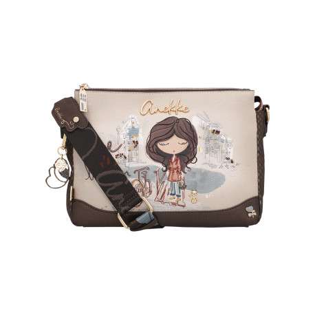 Sac à bandoulière beige pourvu d'une large bandoulière réglable