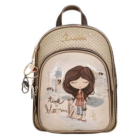 Sac à dos beige à motifs pourvu de bretelles réglables et d'une anse à main