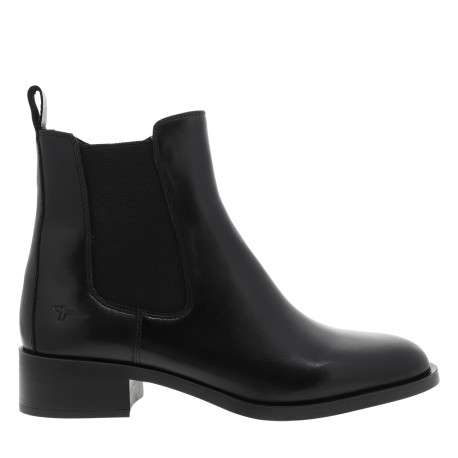 Boots en cuir noir à un talon décroché bas munies d'un zip latéral