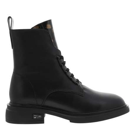 Bottines en cuir noir à talon décroché bas dotées de lacets élastiqués