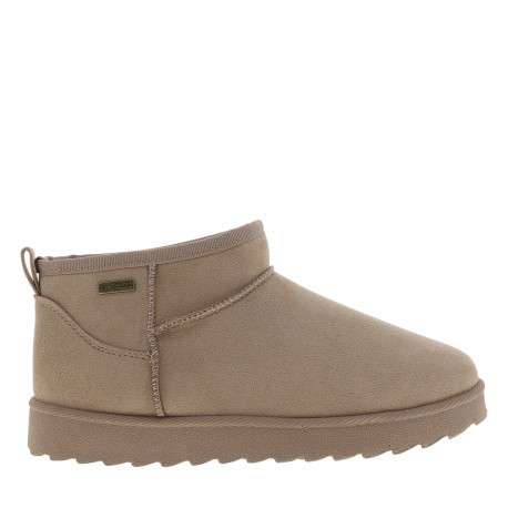 Boots beiges à talon plat pourvues d'un logo métallique sur le côté