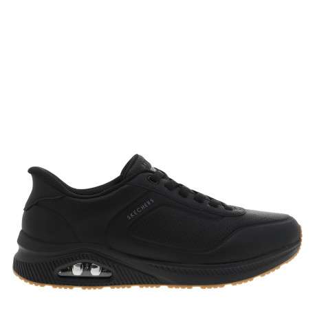 Sneakers noir à talon plat avec un amorti à bulle d'air sur la semelle