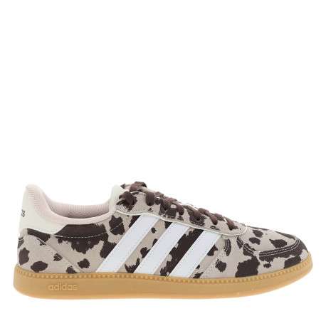 Tennis en cuir beiges à motif vache avec un talon plat et des lacets