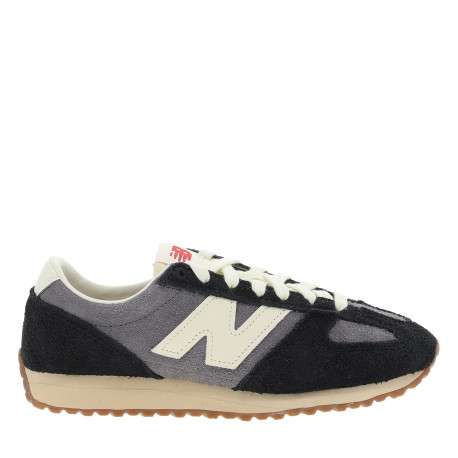 Tennis 471 en cuir noires et grises avec un talon plat et des lacets