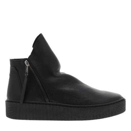 Boots en cuir noires avec semelle à talon compensé bas et glissières