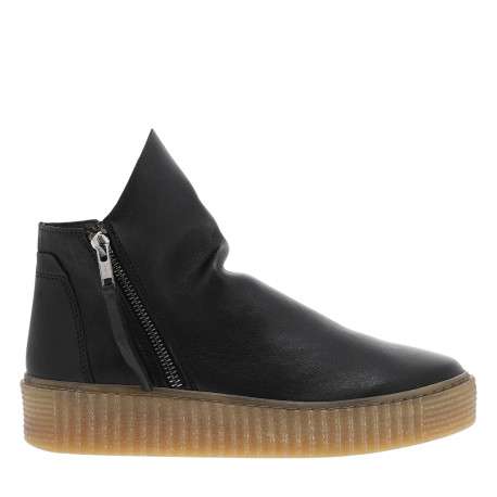 Boots en cuir noires avec semelle à talon compensé bas et glissières