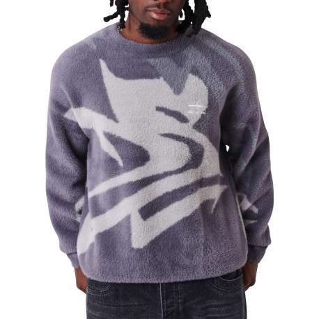 Pull gris poilu à motifs abstrait pourvu d'une coupe large et un col rond