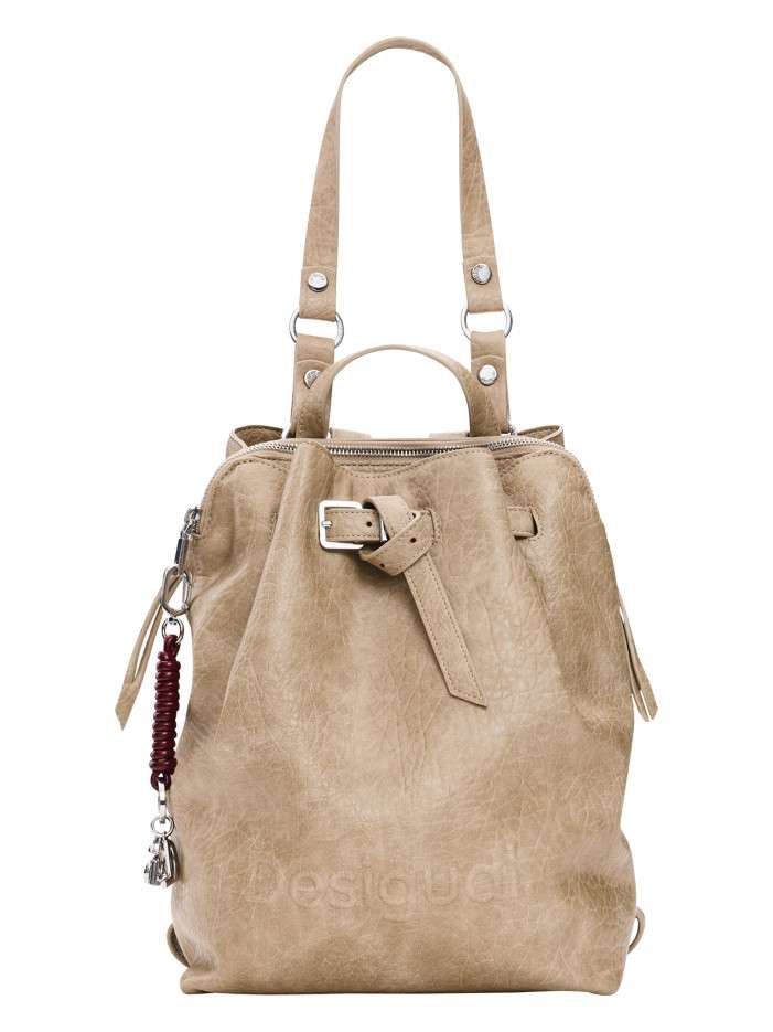 Sac à dos beige pourvu de...