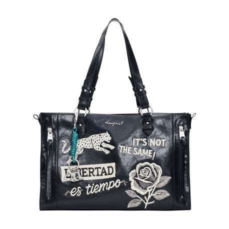 Sac à main noir en maille lisse orné de broderies contrastées à l'avant