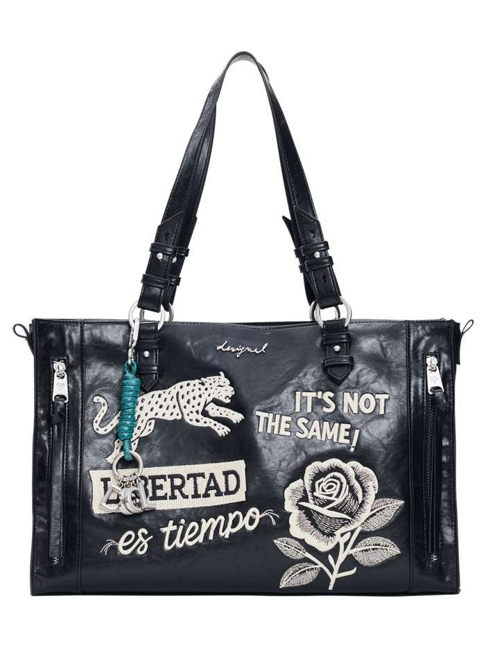 Sac à main noir en maille...