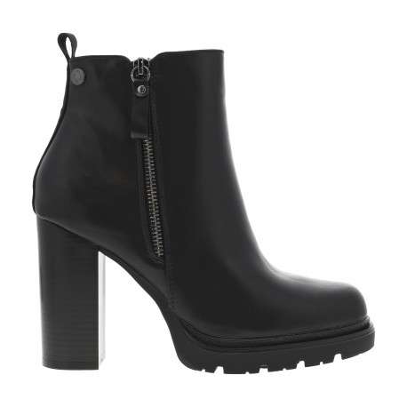 Boots noires avec un talon décroché haut et un zip de chaque côté