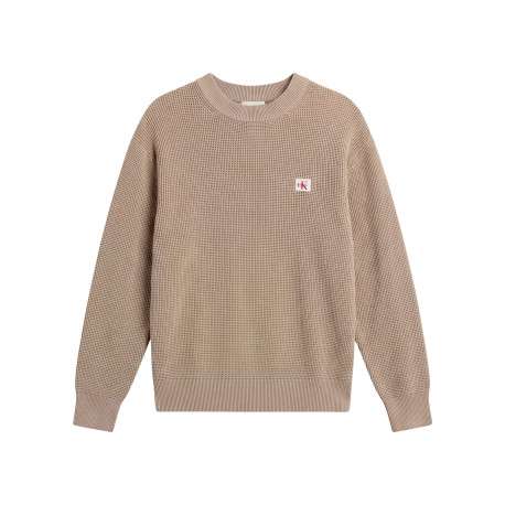 Pull en coton beige à coupe droite pourvu d'un col rond et de manches longues