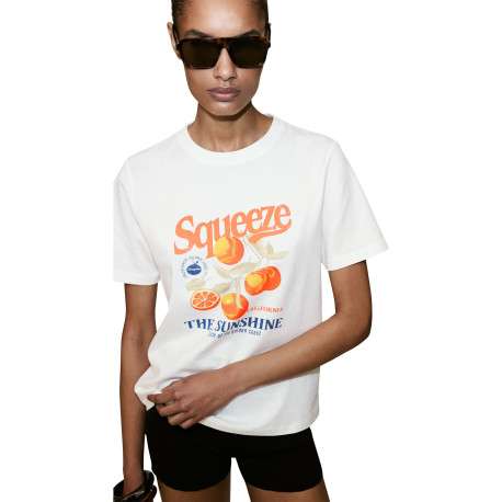 T-shirt en coton blanc à imprimé avec une coupe droite et un col rond - Image 3