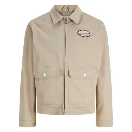 Blouson beige à coupe droite pourvu d'un col à revers et de manches longues