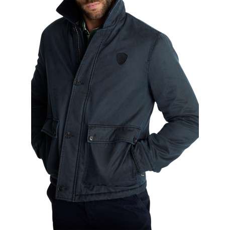 Blouson bleu marine pourvu d'une coupe droite et un col montant