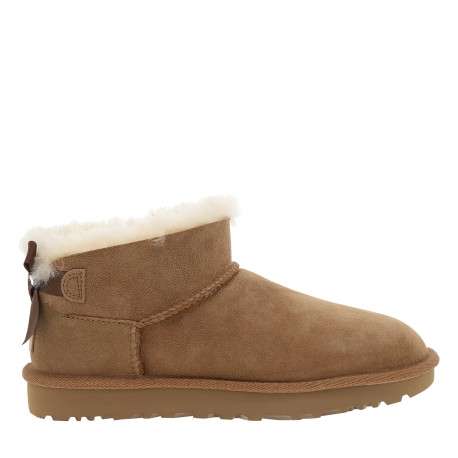 Boots Ultra Mini Bailey Bow en cuir suédé sable à talon plat ornées d'un nœud