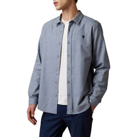 Chemise en coton blanc et bleu à rayures verticales munie d'une coupe droite