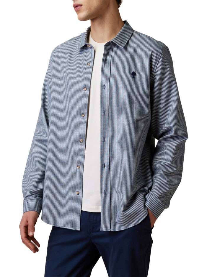 Chemise en coton blanc et bleu à rayures verticales munie d'une coupe droite