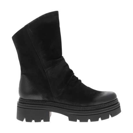 Bottines en cuir noires à talon décroché bas pourvues d'une fermeture zippée