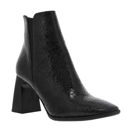 Bottines noires à talon haut avec un zip latéral aspect vernis