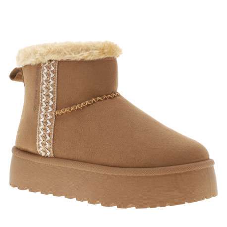 Boots brunes à talon compensé pourvue d'une doublure en fausse fourrure