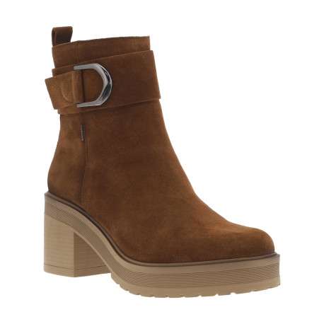 Boots en cuir marron à talon décroché moyen avec un zip sur le côté