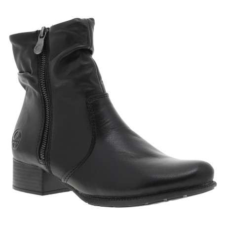 Boots en cuir noires à talon décroché bas avec un zip de chaque côté